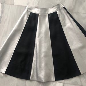 Stunning never worn black and silver leather skirt
